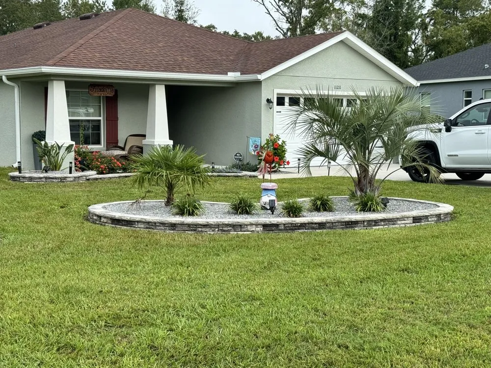 Affordable lawn mowing service for year-round maintenance in Summerfield, FL by Pristine Hardscape & Landscaping