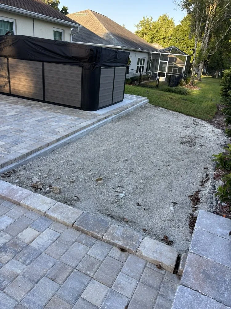 Affordable yard cleanup service for residential properties in Summerfield, FL by Pristine Hardscape & Landscaping