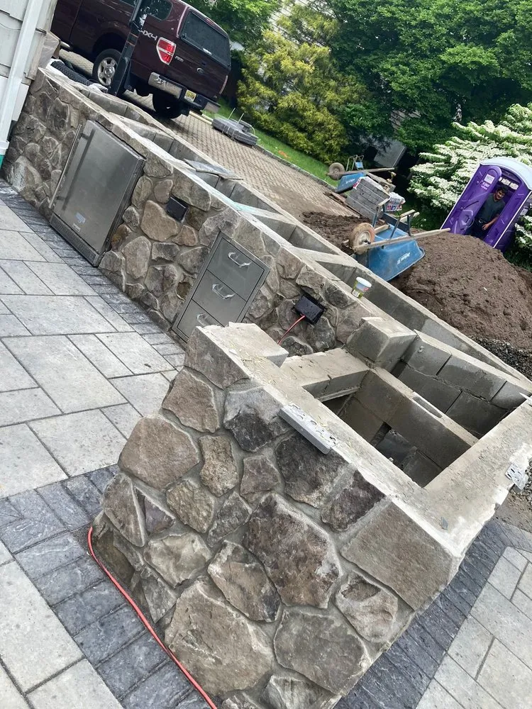 Professional landscape installation in Spring Valley, NY by Pristine Stonework & Landscape Design