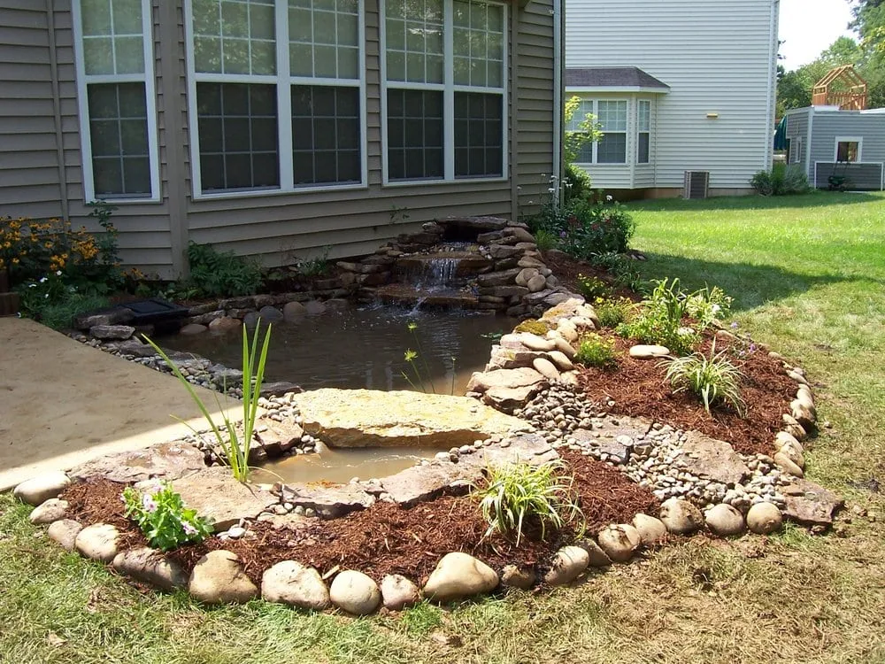 Custom lawn mowing service for year-round maintenance in Fenton, MO by Pro Care Landsaping