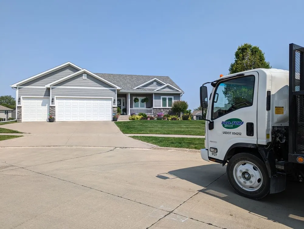 Affordable landscape design for year-round maintenance in Indianola, IA by Pro Turf Service