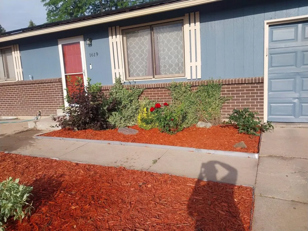 Professional yard maintenance in Greeley, CO by Productive Stone