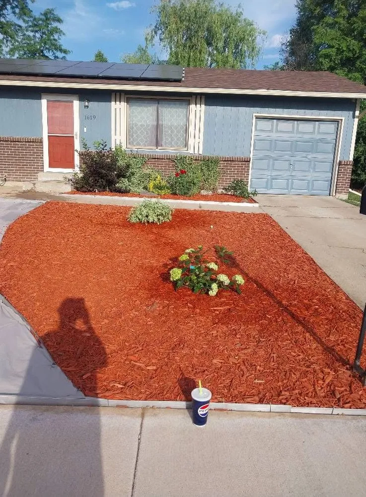 Affordable lawn mowing service in Greeley, CO by Productive Stone