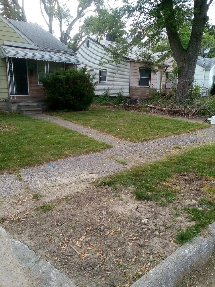 Custom lawn mowing service for outdoor upgrades in Detroit, MI by Professional Kuts Lawncare & Hauling Services