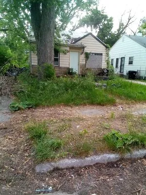 Professional Kuts Lawncare & Hauling Services Logo