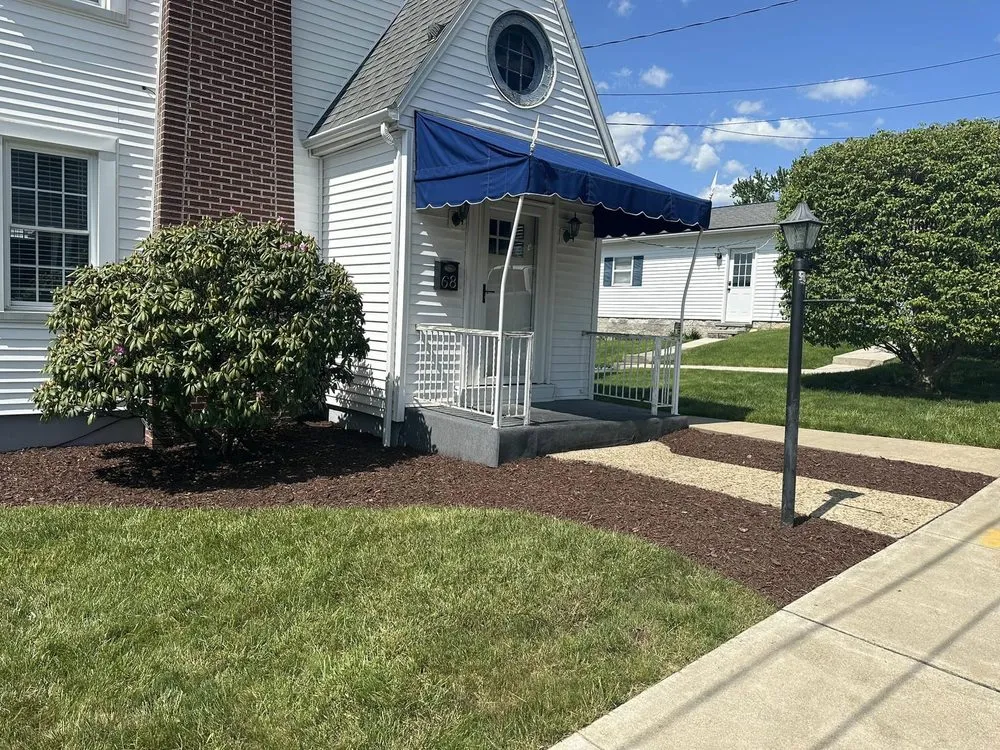 Local lawn mowing service for residential properties in Uniontown, PA by Professional Land & Design