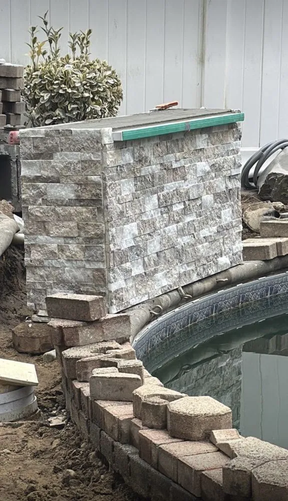 Affordable landscape installation in Central Islip, NY by Professional Masters In Construction And Lawn