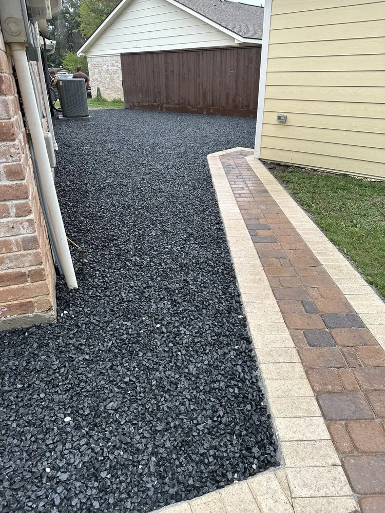 Professional yard cleanup service for year-round maintenance across Houston, TX - Professional Pavers