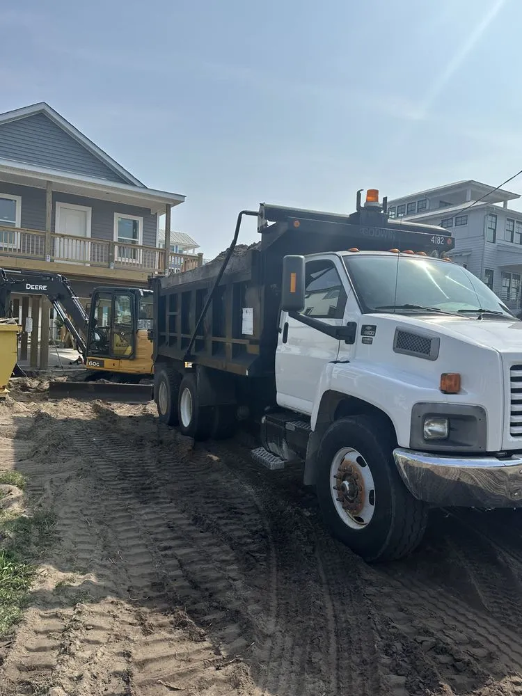 Custom landscape installation with custom design across Riegelwood, NC - Promised Land Services