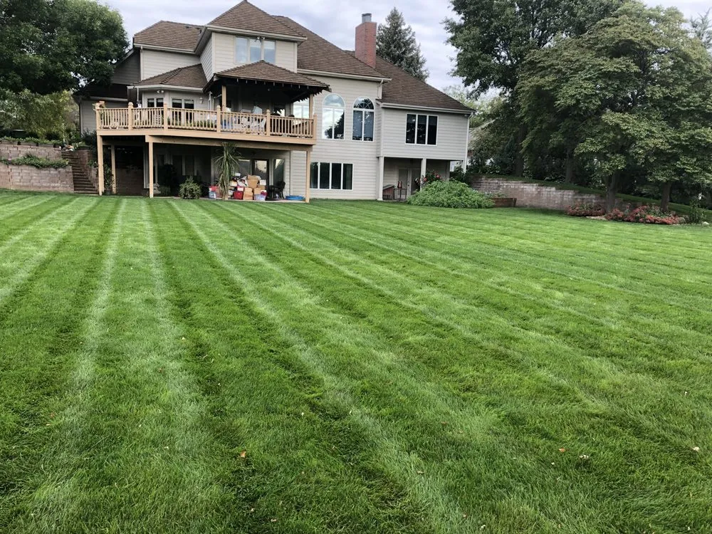 Affordable lawn mowing service for homes in La Vista, NE by Property Enhancement Services