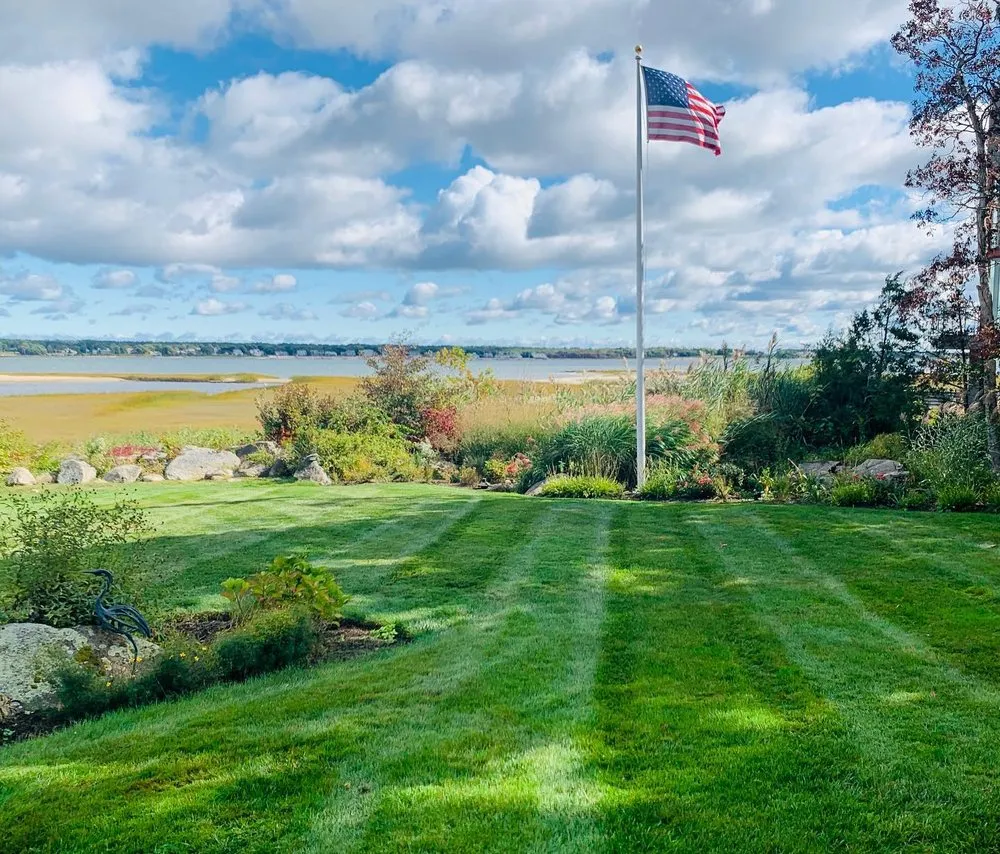 Trusted yard cleanup service for year-round maintenance in Marion, MA by Property One Landscape Contractors