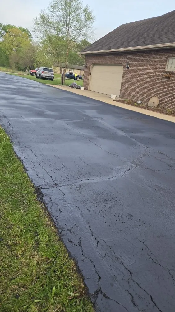 Custom landscape installation for year-round maintenance in Whiteland, IN by Pro's Asphalt
