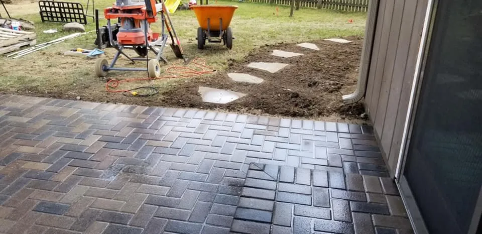 Custom lawn mowing service with custom design in Carmel, IN by Proscape Property Maintenance