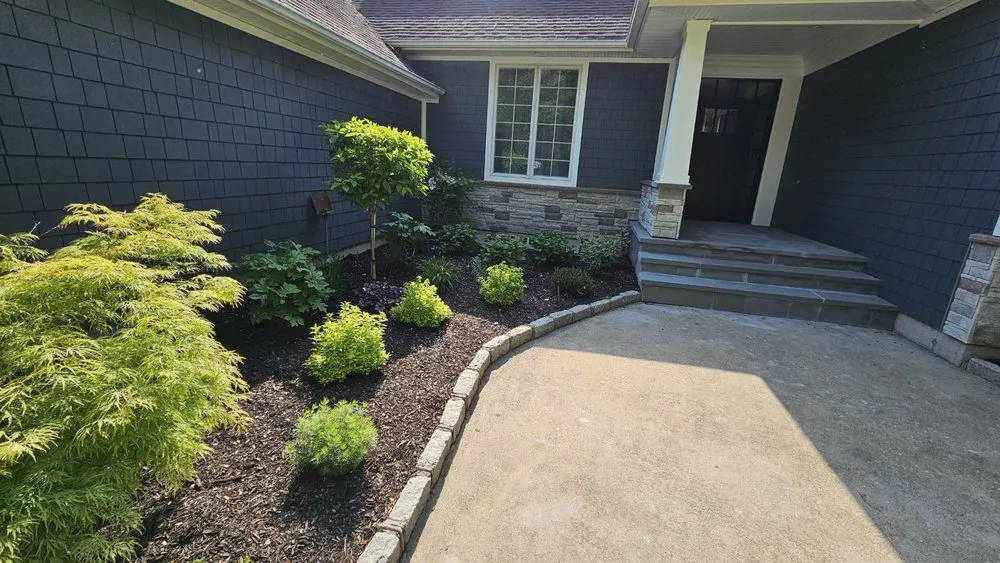Reliable lawn mowing service with custom design in East Patchogue, NY by Proscapes Landscaping