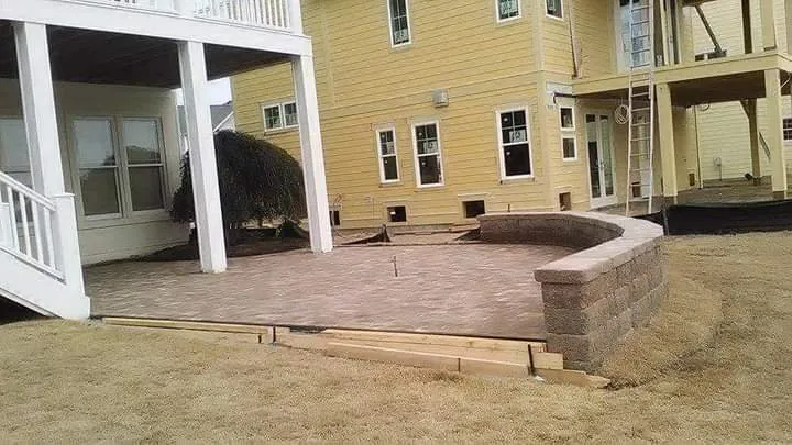 Custom yard cleanup service with custom design in Wilmington, NC by Prosper Lawns Camping