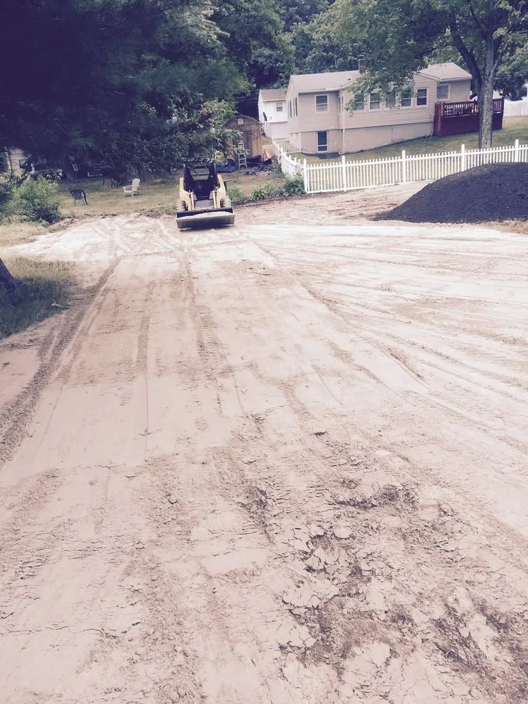 Professional yard cleanup service for outdoor upgrades in Attleboro, MA by Proud Landscapes & Excavation