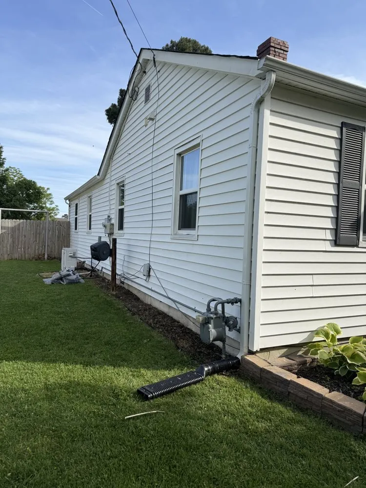 Custom landscape installation in Newport News, VA by Pruett’s Lawn Service