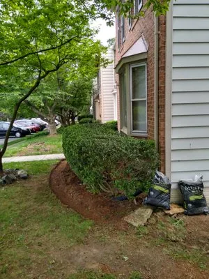 Prutty work lawn care and landscape services Logo