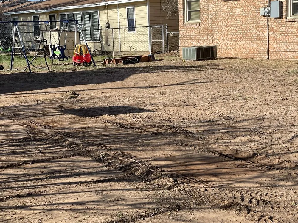 Custom yard cleanup service in Burkburnett, TX by Pugs Green Lawn And Contract Service