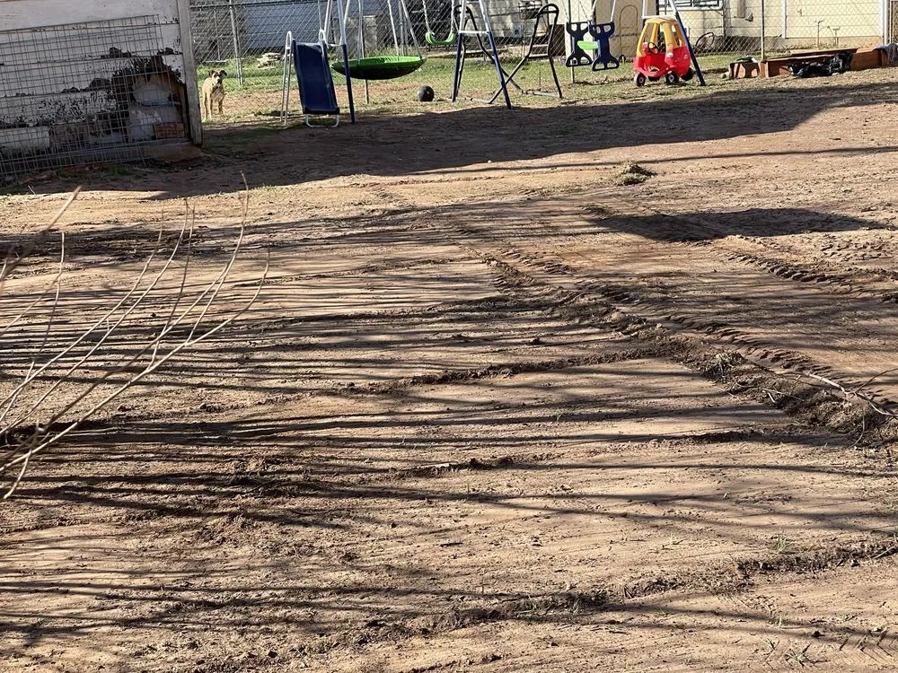 Custom yard cleanup service in Burkburnett, TX by Pugs Green Lawn And Contract Service