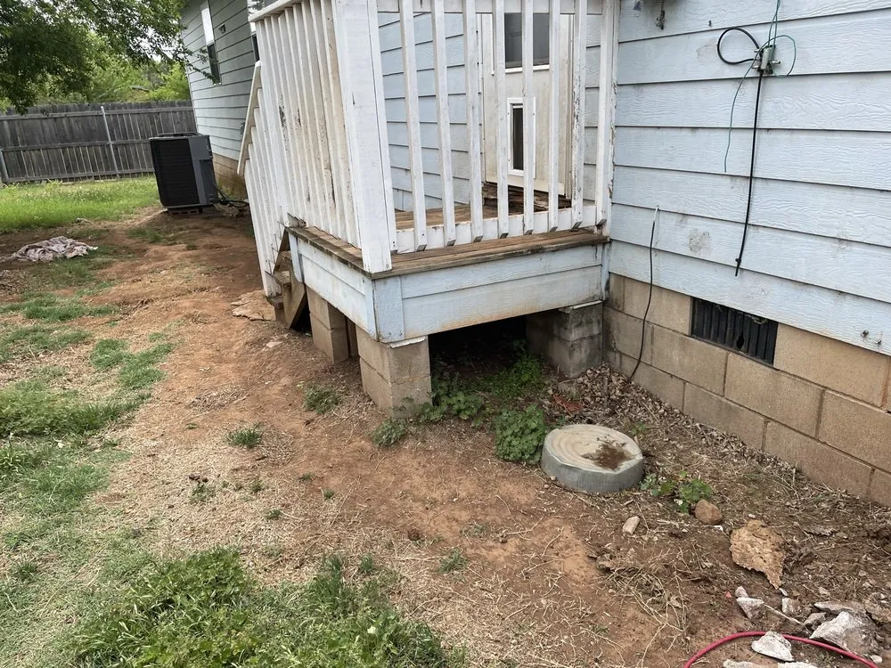 Custom landscape installation in Burkburnett, TX by Pugs Green Lawn And Contract Service