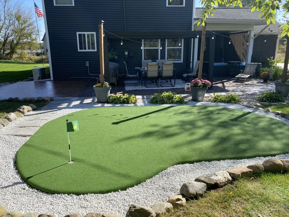 Professional lawn care service with custom design across Lowell, MI - Purchase Green Artificial Grass - West Michigan