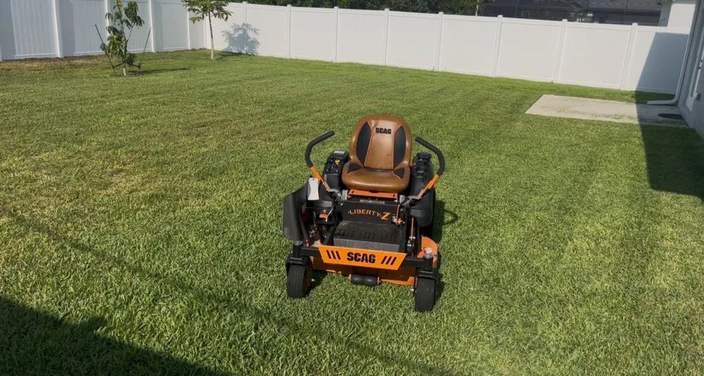 Professional lawn mowing service for residential properties in Lake Worth, FL by Pure Green LSDB