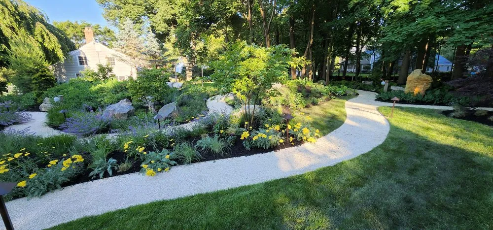 Custom landscape installation in East Northport, NY - Pure Masonry & Landscape Contractors