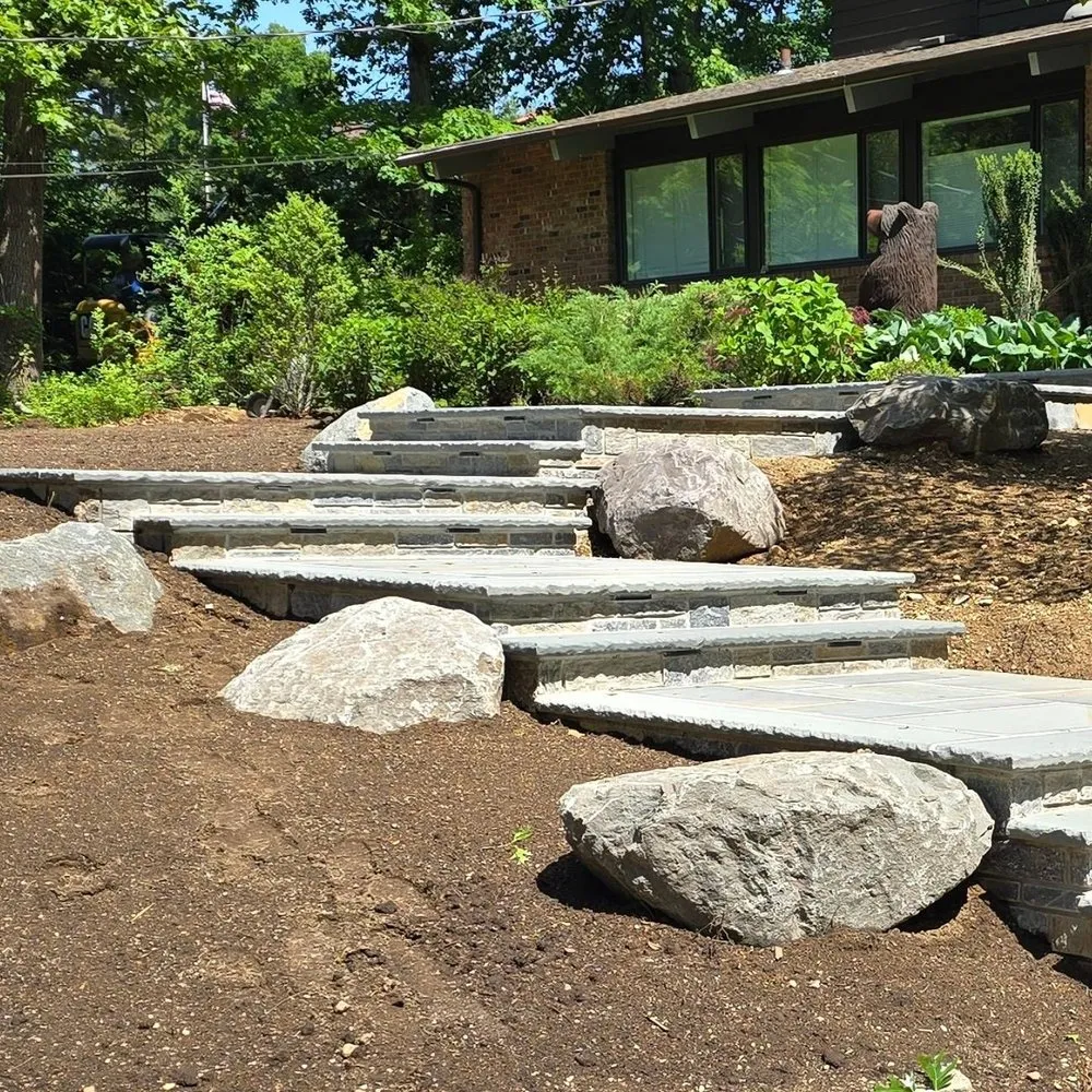 Top-rated lawn care service for residential properties in East Northport, NY by Pure Masonry & Landscape Contractors