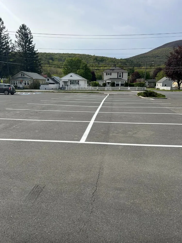 Affordable lawn care service in North Adams, MA by Purple Cow Property Management