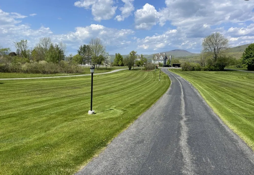 Local lawn care service in North Adams, MA by Purple Cow Property Management