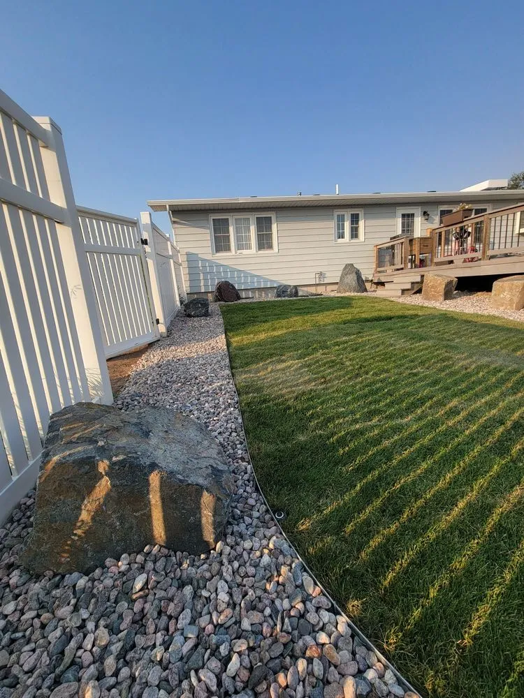 Professional yard cleanup service for residential properties in Cheyenne, WY by Q Lawn