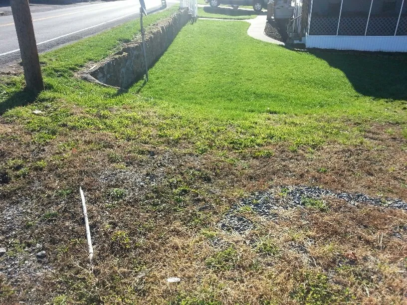 Professional residential landscaping for homes in Burton, WV by QBC Express Grass