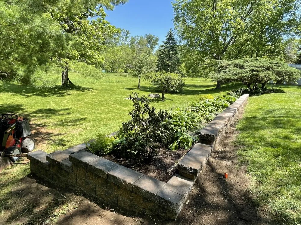 Local garden landscaping with custom design in Bettendorf, IA by QC Lawnworks