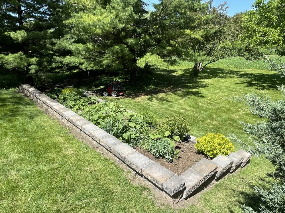 Custom landscape design for outdoor upgrades in Bettendorf, IA by QC Lawnworks