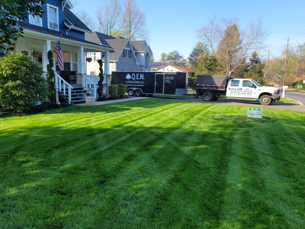 Trusted lawn mowing service for residential properties in South Brunswick Township, NJ by QEN Landscaping