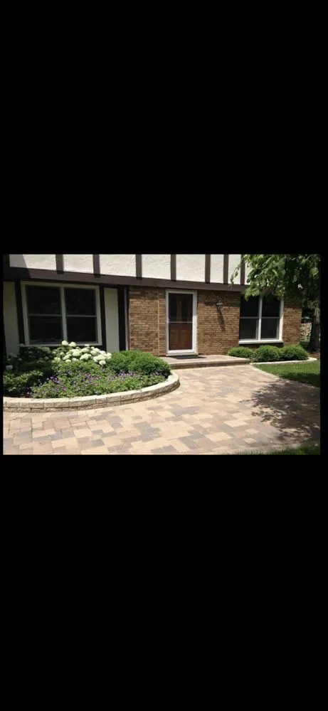 Affordable lawn mowing service for residential properties in Grant Township, IL by Q's Landscaping