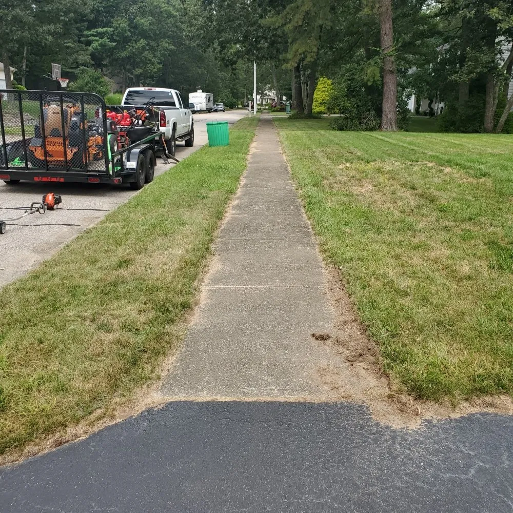 Reliable outdoor landscaping with custom design in Coventry, RI by Q's Quality Lawn Care