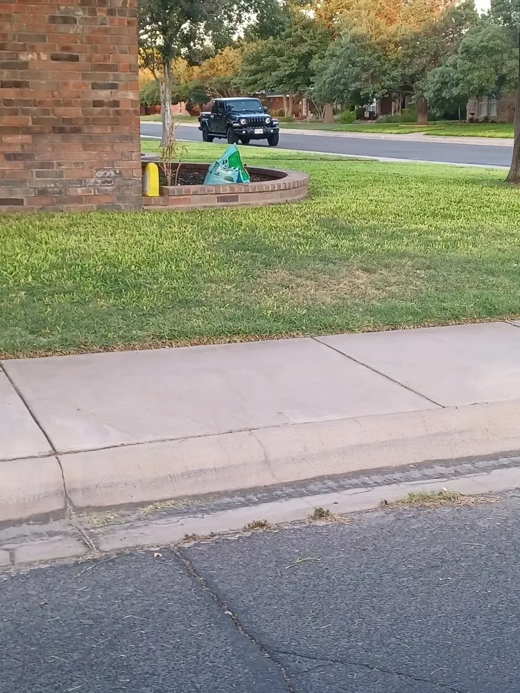 Custom lawn care service for residential properties in Midland, TX by Q's Quality Lawnservice