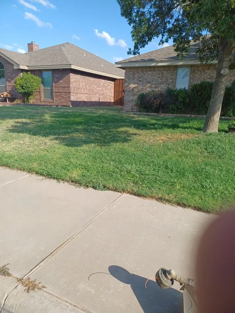 Trusted lawn mowing service in Midland, TX by Q's Quality Lawnservice