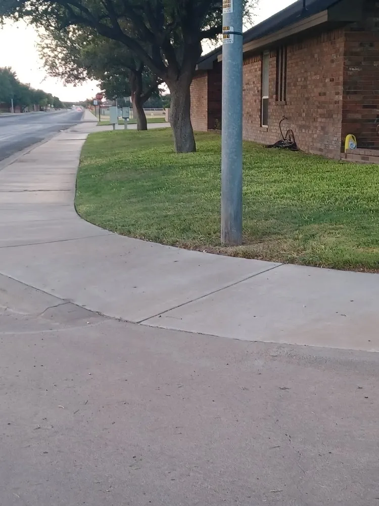 Custom landscape installation for beautiful yards in Midland, TX by Q's Quality Lawnservice