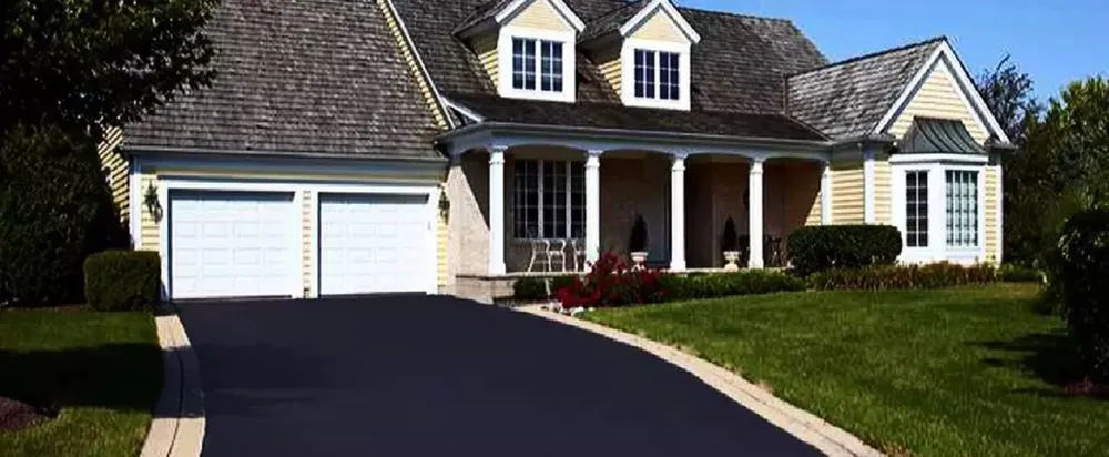 Custom lawn mowing service for residential properties across Worcester, MA - Quality Asphalt Sealcoating & Services