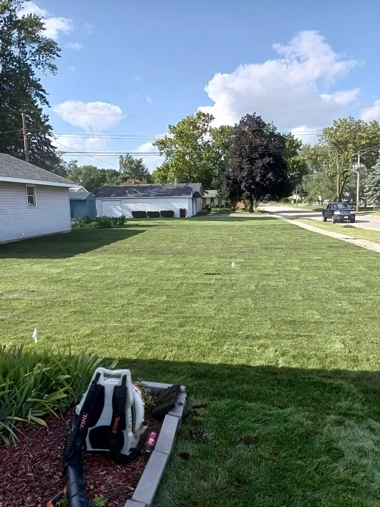 Reliable lawn care service for homes in Rockford, IL by Quality concrete & landscaping