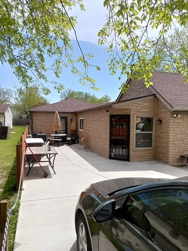 Professional yard maintenance for homes across Rockford, IL - Quality concrete & landscaping