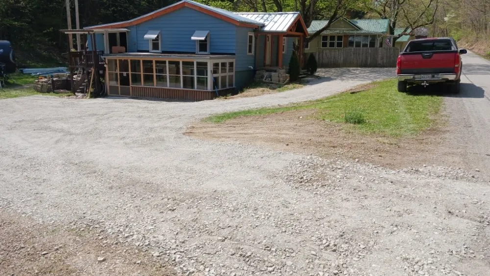 Custom lawn mowing service in Murray City, OH by Quality Contracting & Services