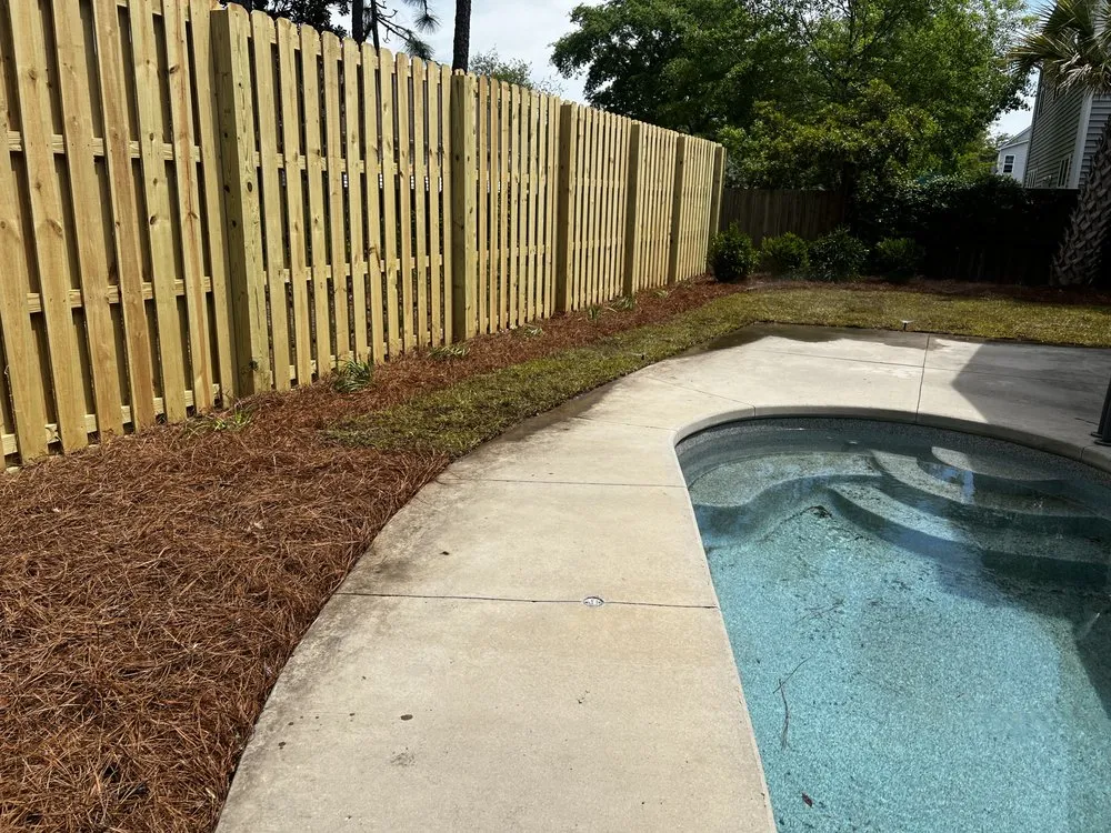 Professional landscape installation with custom design in Currie, NC by Quality Fence And Landscape