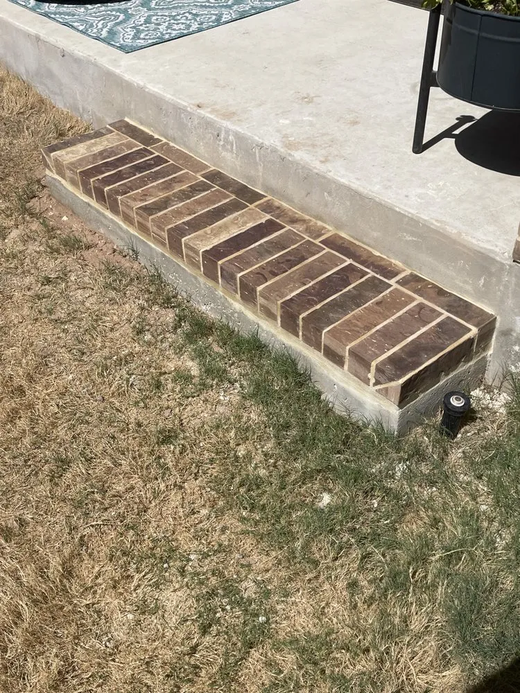 Local lawn mowing service with custom design in Seguin, TX by Quality First Masonry