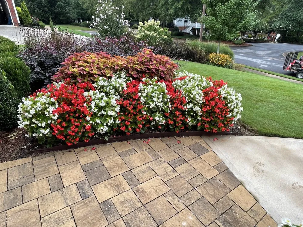 Custom lawn mowing service for beautiful yards in Jonesboro, GA by Quality Gardens