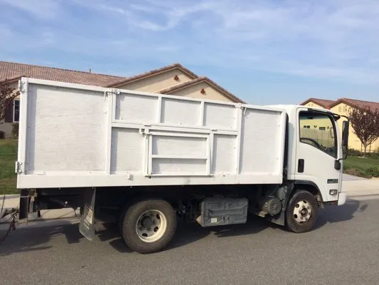 Quality Garderning & Landscape Service Logo