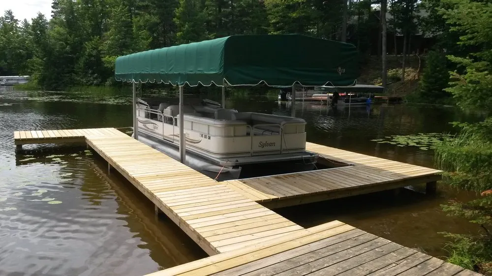 Affordable yard maintenance for homes in Minocqua, WI by Quality Grading And Landscaping